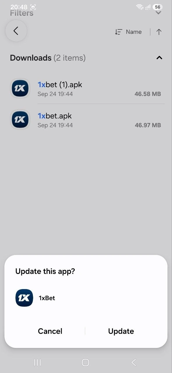 Android Update this app dialog for 1xBet over the APK files in the Downloads folder