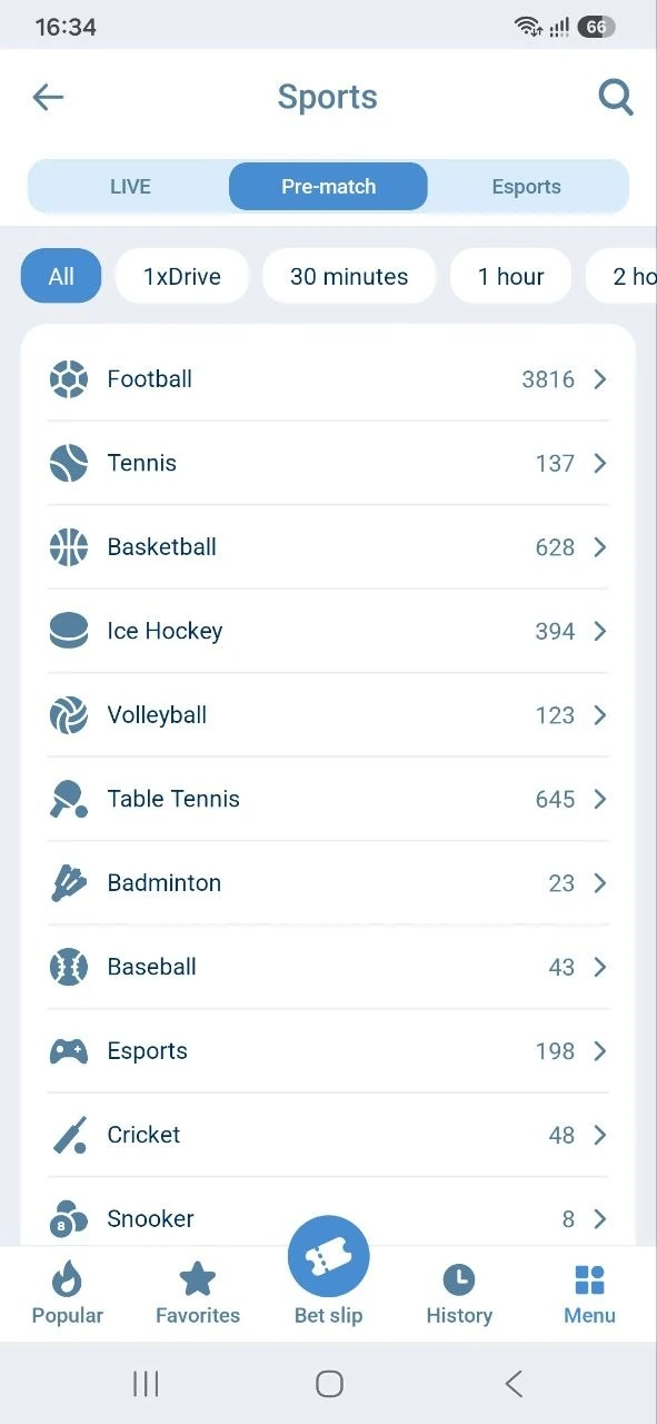 1xBet Android app pre-match sports list with event counts and the bottom menu: Popular, Favorites, Bet slip, History, Menu