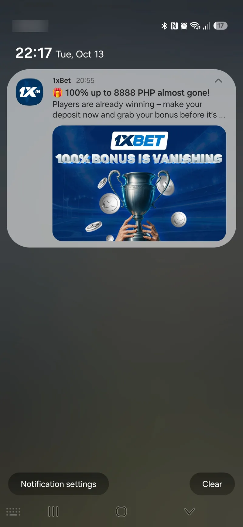 1xBet Lite push notification on Android offering a 100 percent bonus up to 8888 PHP